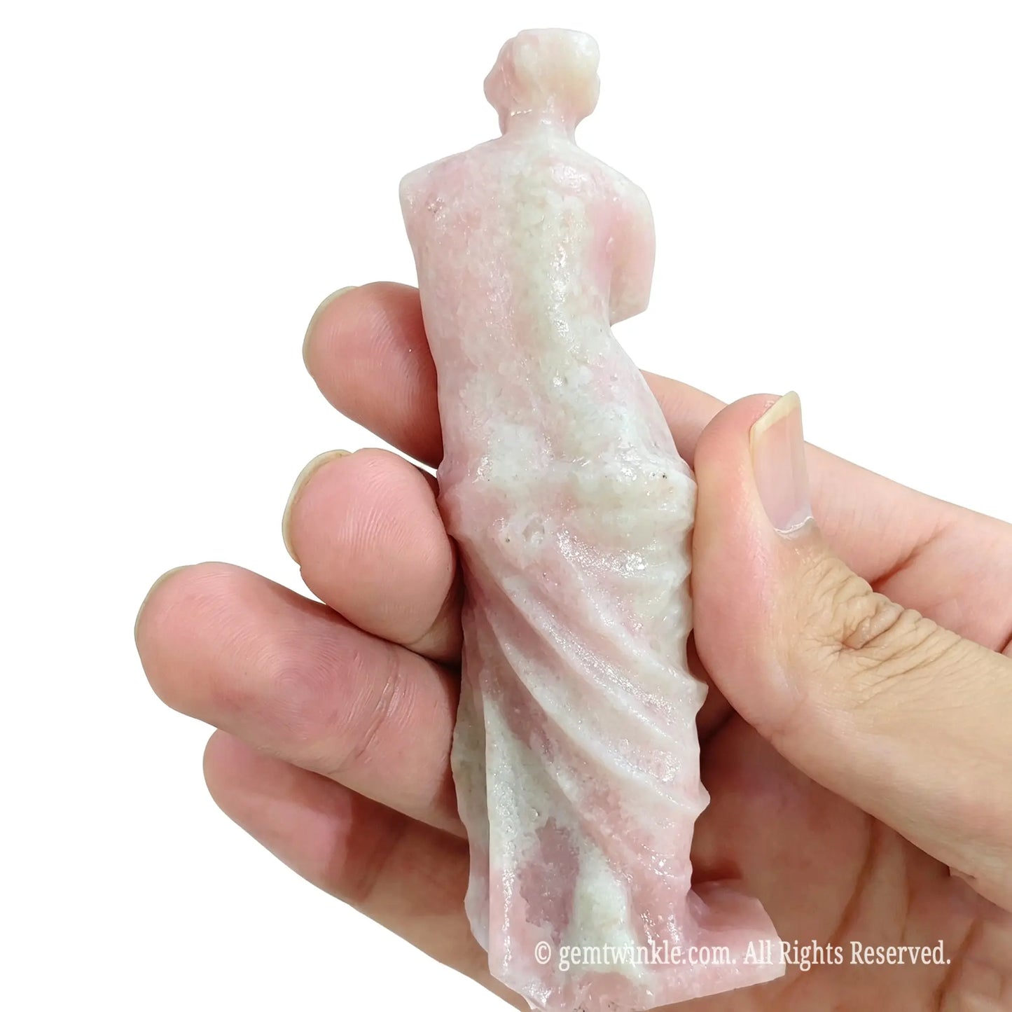Back view of natural pink opal Venus statue in hand showing polished hair details and natural mineral textures
