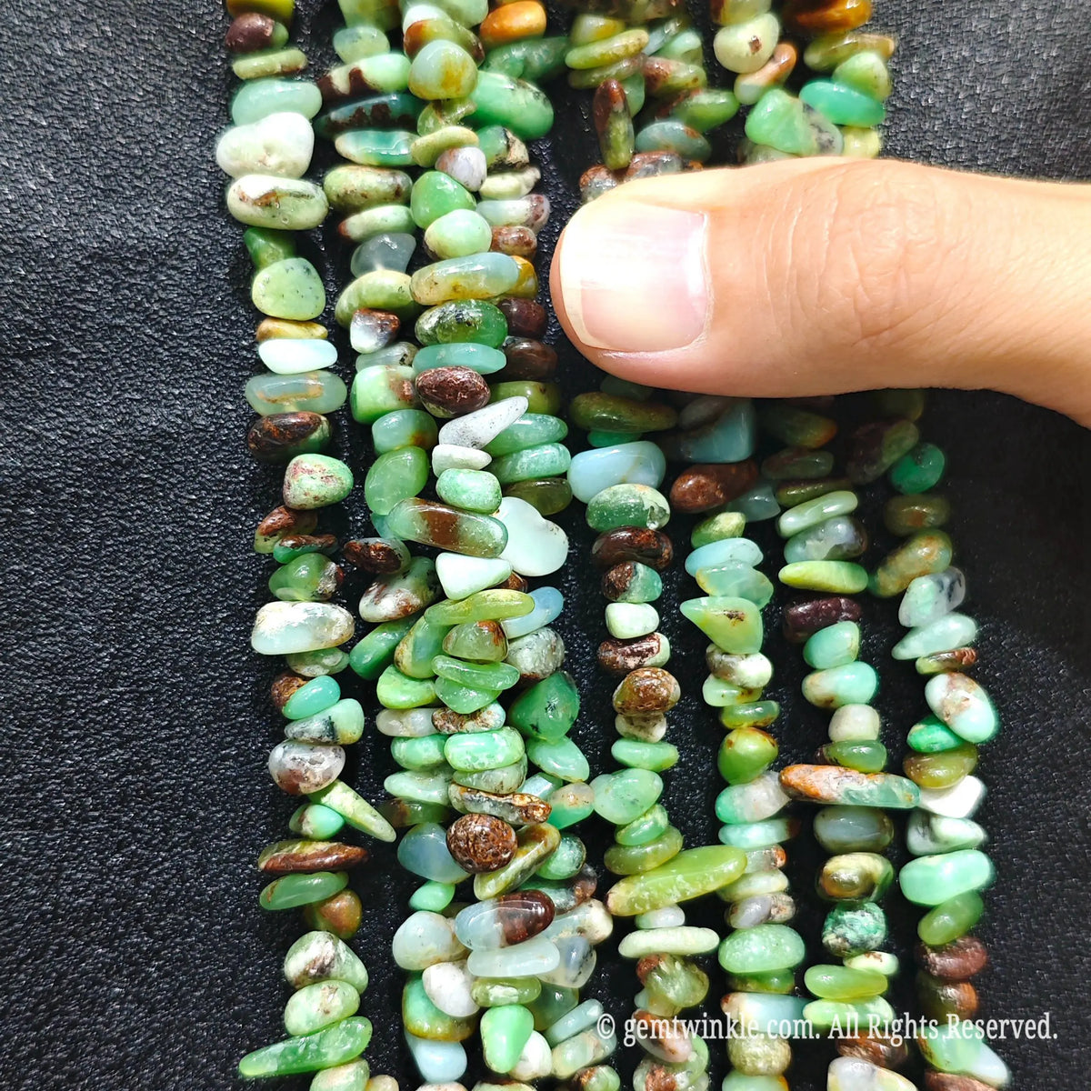 Detailed view of 75cm long natural australian chrysoprase tumbled chipped gemstone strand for jewelry DIY