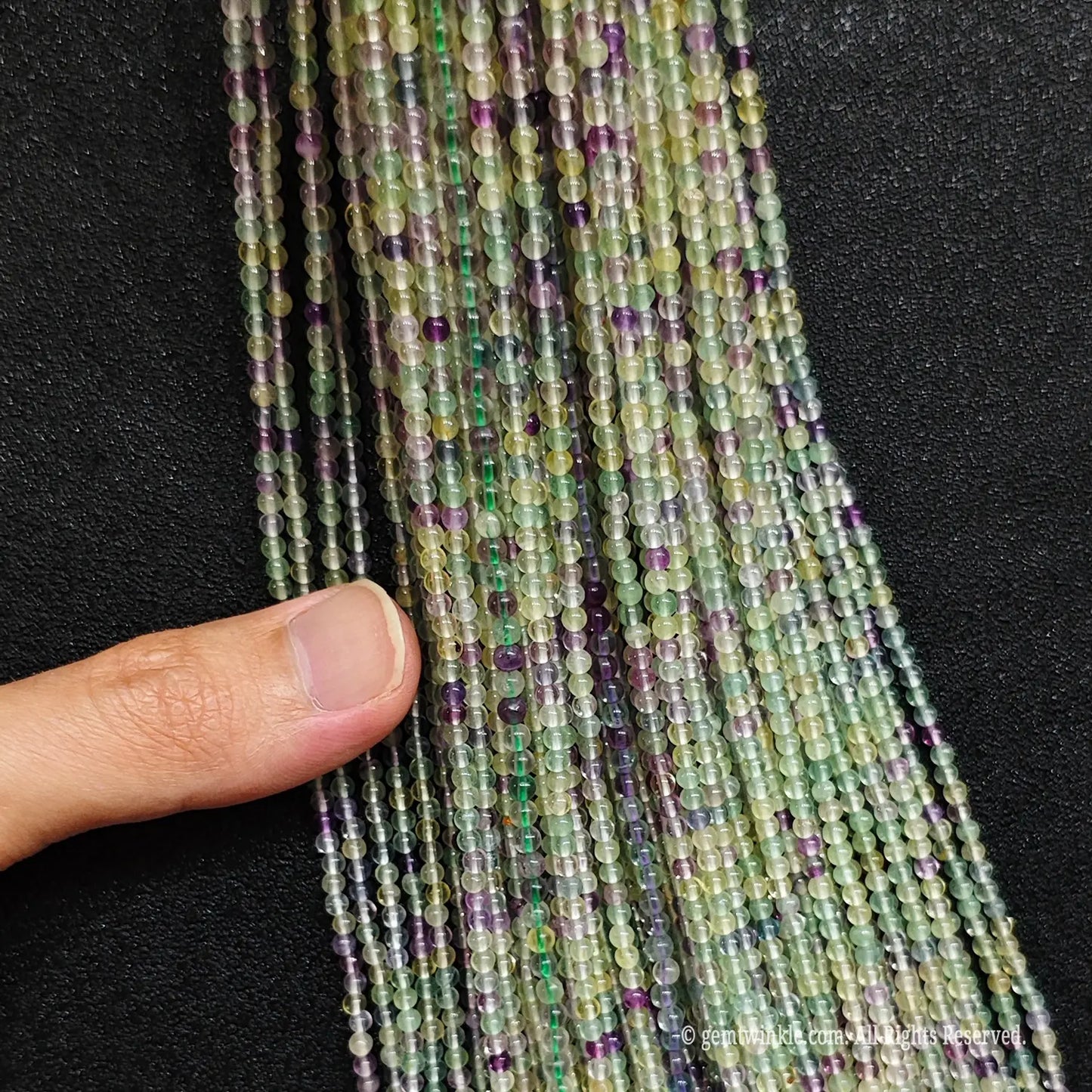 Handmade supply of tiny 3mm rainbow fluorite gemstone beads for organic jewelry design