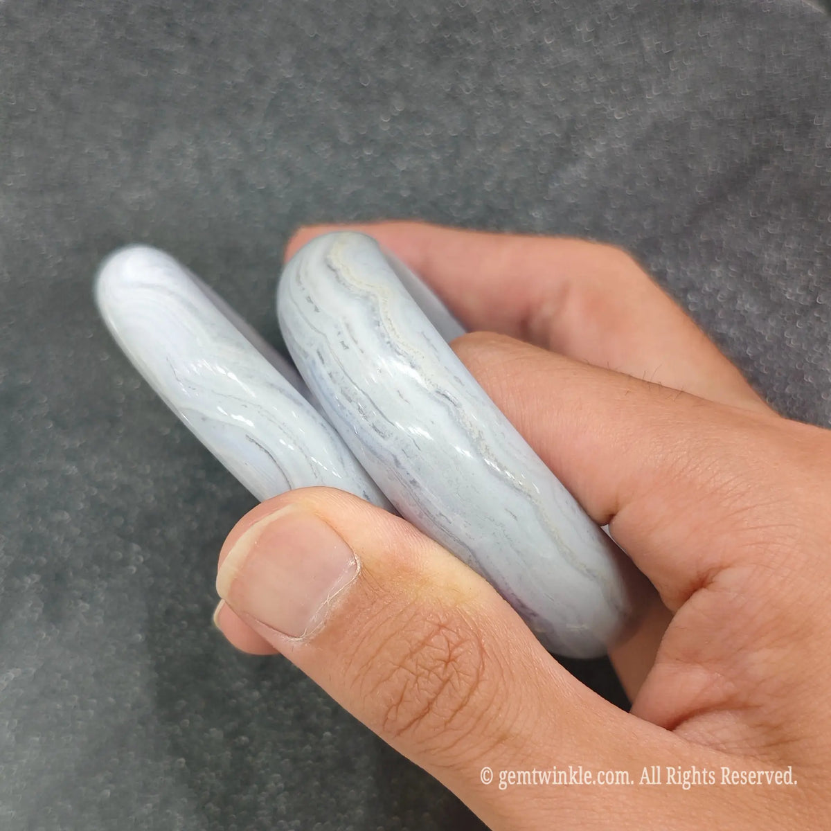 Natural Blue Lace Agate bangles held together demonstrating genuine mineral stripes and high gloss finish