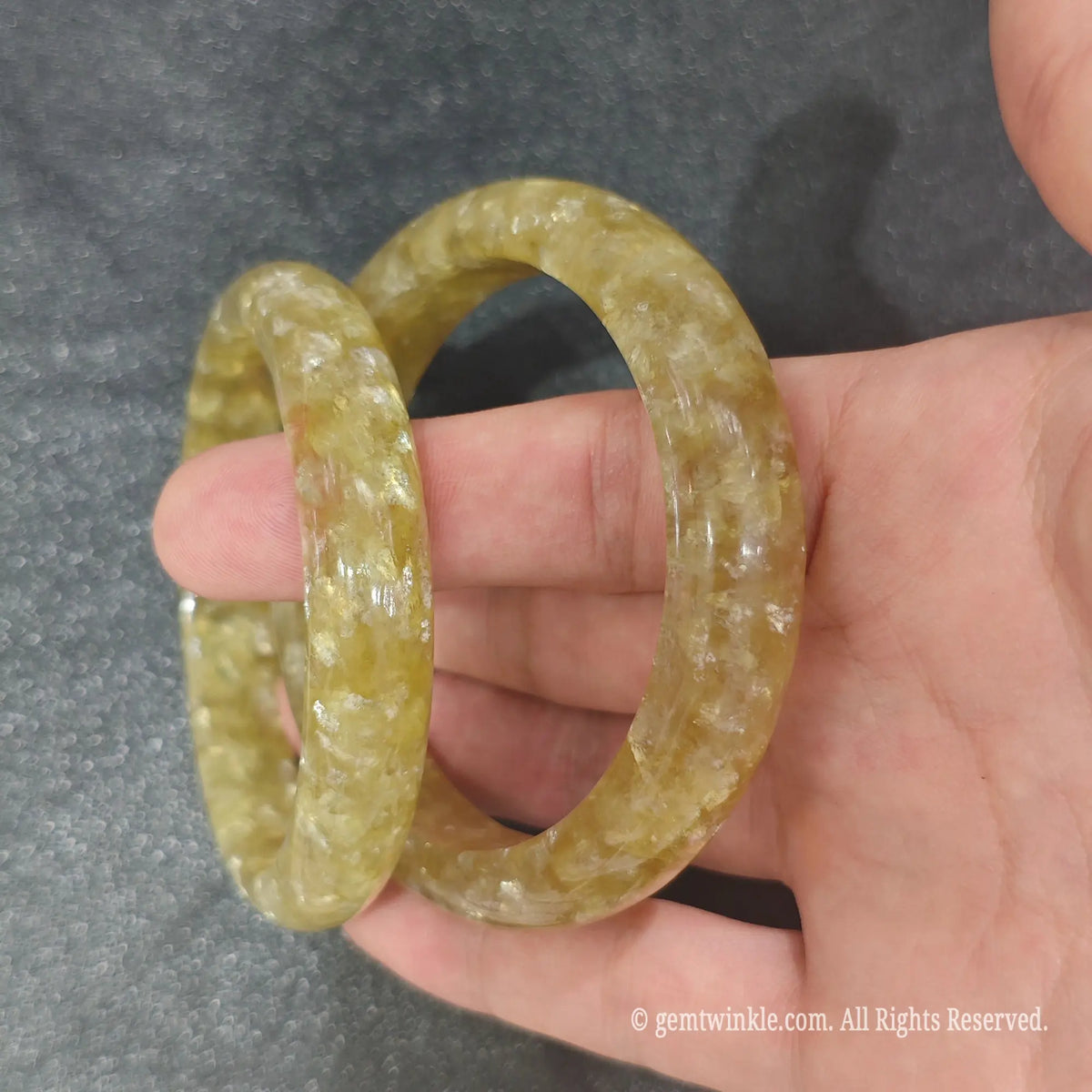 Natural Golden Mica bangles held together demonstrating unique natural mineral luster and chatoyancy