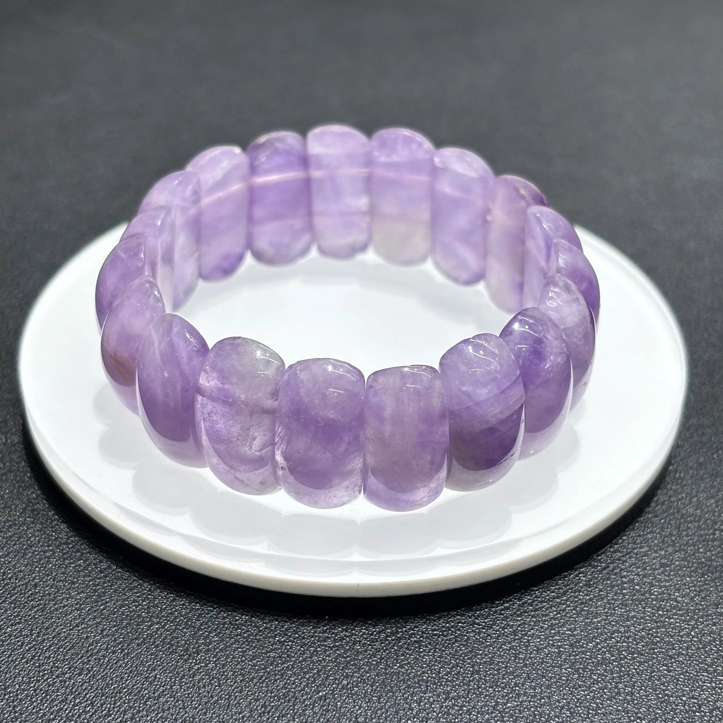 Single Natural Lavender Amethyst Moon Bead Bracelet displayed on white plate, ideal for meditation and spiritual clarity
