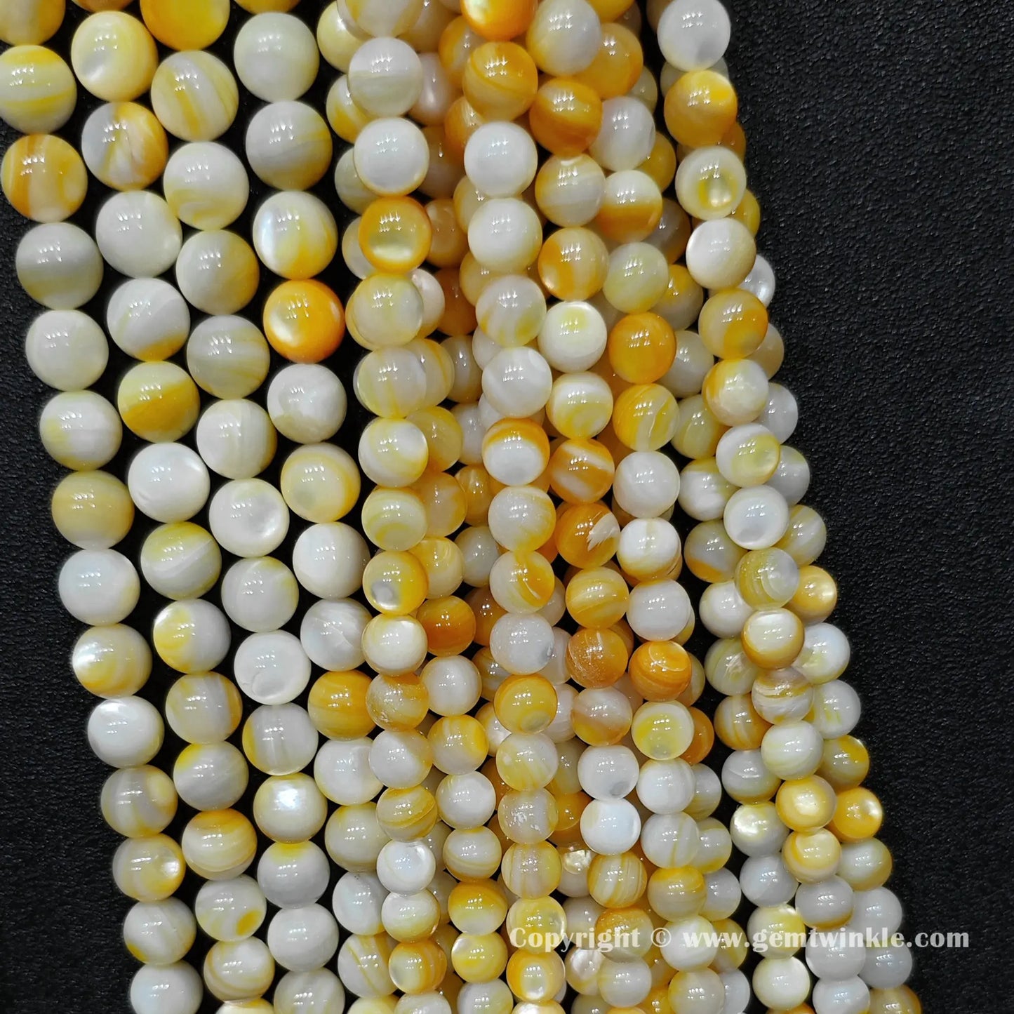Boutique wholesale display of real fade resistant dyed marine shell round beads perfect for small business sourcing and mix and match ordering