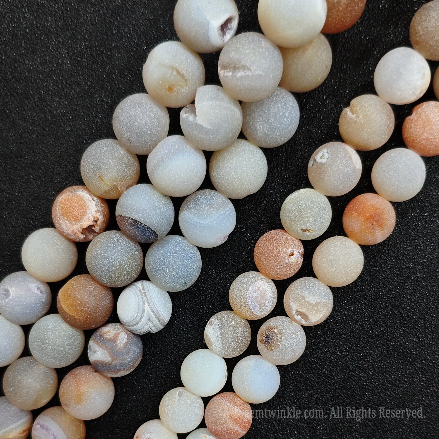 Boutique crystal supplies showing a premium batch of hand selected 12mm matte druzy agate geode strands for small wholesale buyers