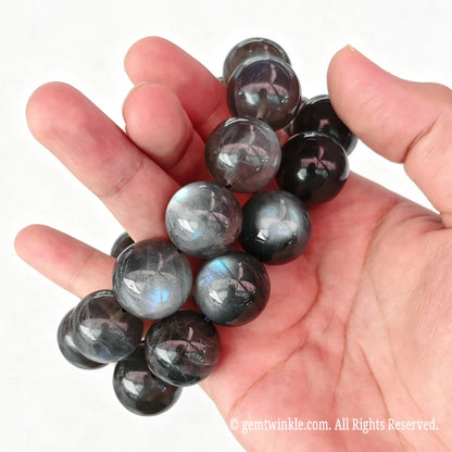 Preview of single-strand 20mm grey moonstone round bead bracelet with blue and silvery sheen