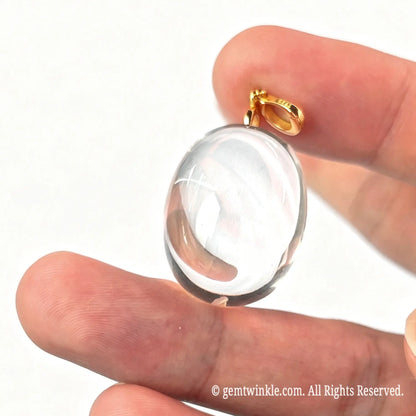 Preview of 25mm AA grade clear quartz oval pendant with smooth polished finish