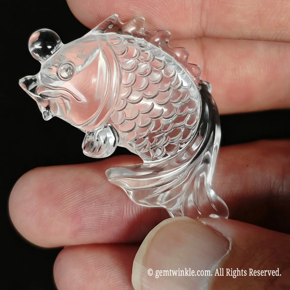 Side preview of 3cm clear quartz koi fish carving highlighting fin and scale details