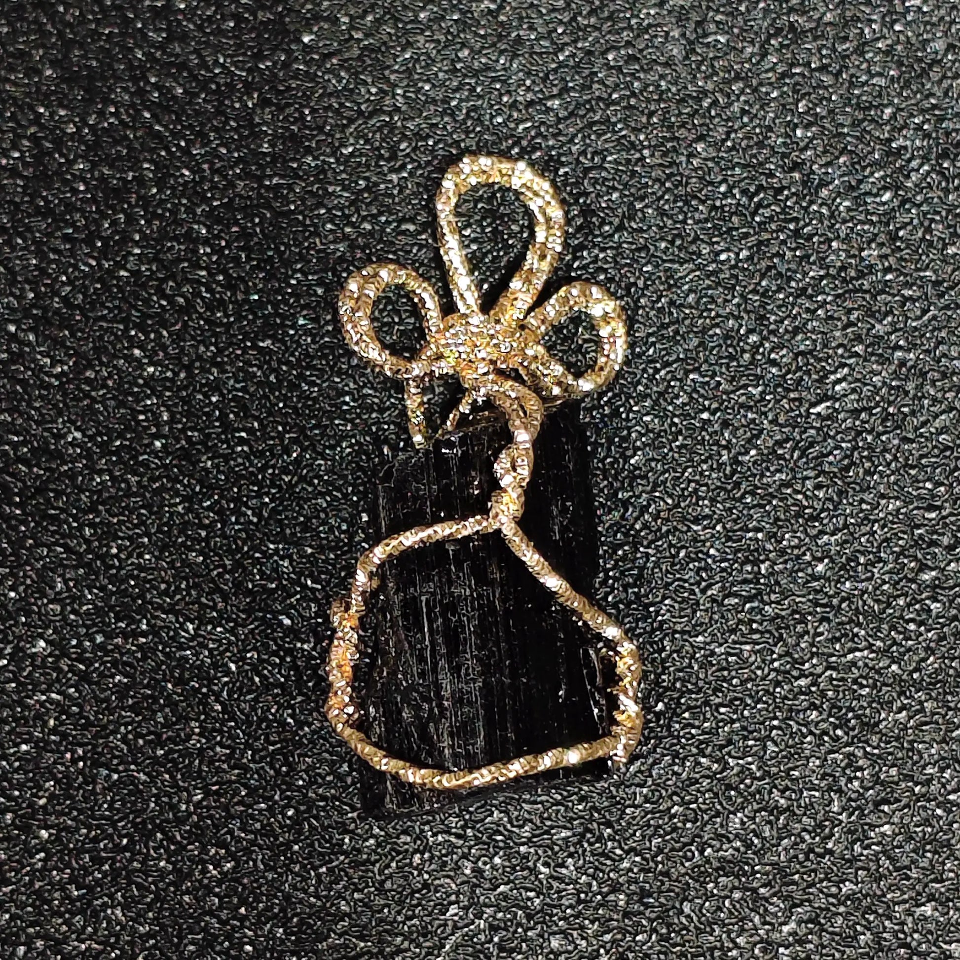 30mm-black-tourmaline-rough-pendant-handheld-view