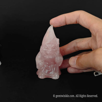 8cm pink rose quartz gnome statue showing natural mineral inclusions and lines
