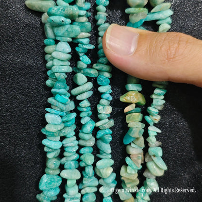 Detailed view of 75cm long natural amazonite tumbled chipped gemstone strand for jewelry DIY