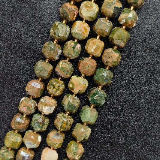 Close up of multi strands of natural bird egg jasper soft-tumbled geometric cube beads showing overall strand layout