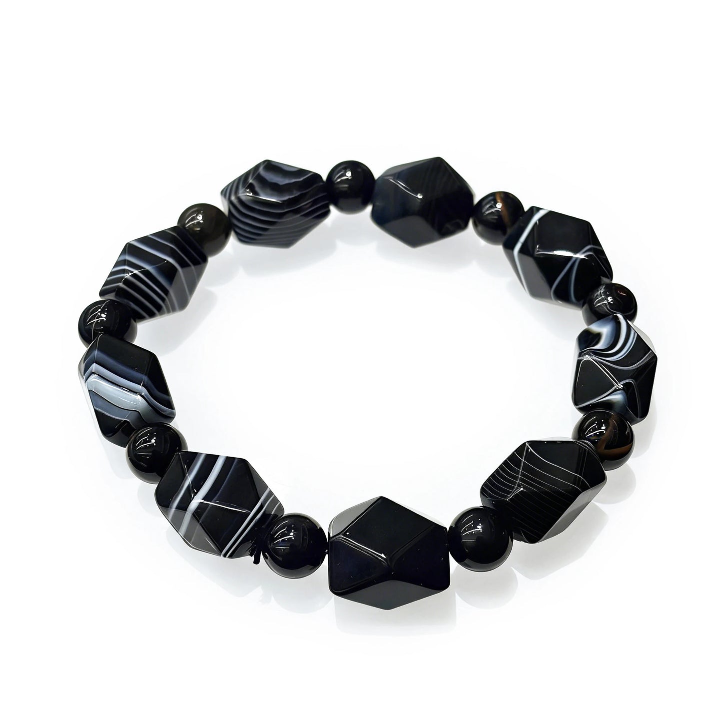 Natural black and white banded agate irregular geometric bead bracelet on white background, statement self-love jewelry for women