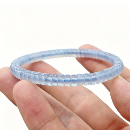 Natural blue agate tablet beads in serene sky blue, 6×3mm size, with subtle banding—stretch elastic design