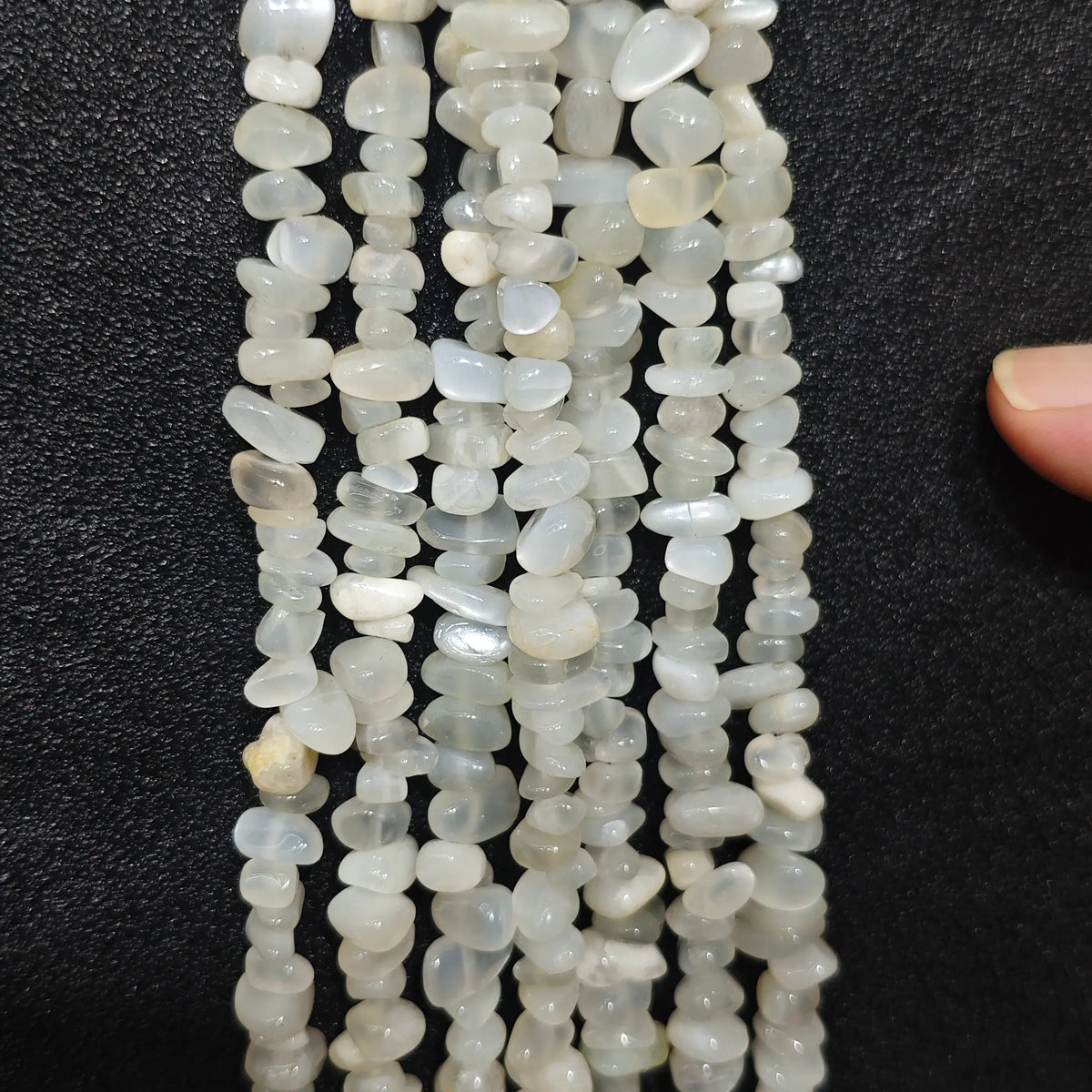 Multiple strands of natural white moonstone 5-10mm irregular chip beads for studio jewelry crafting[cite: 7]