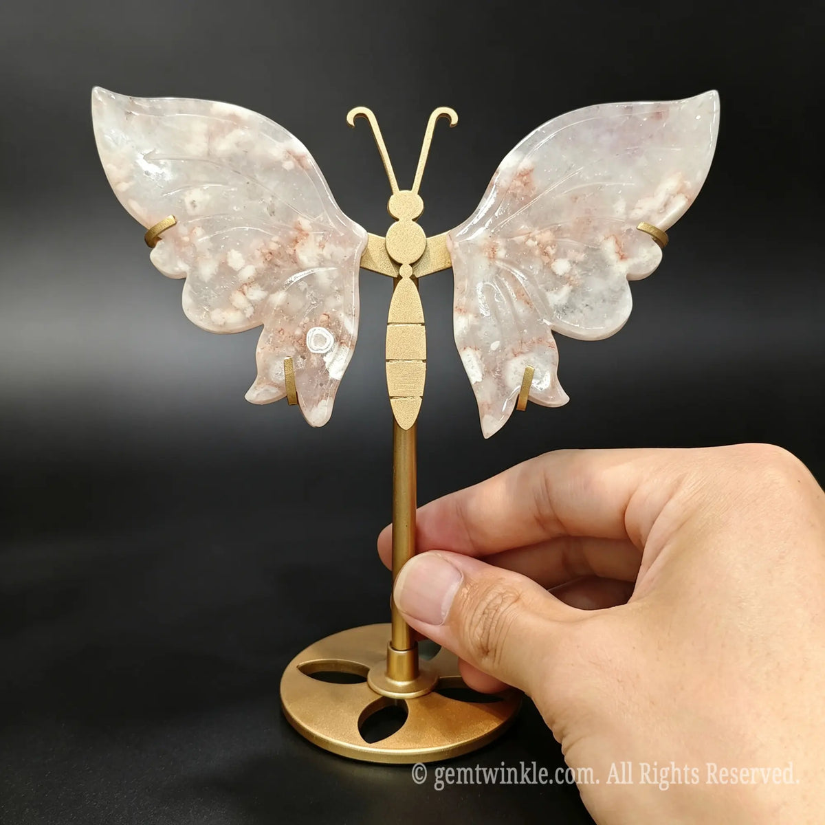 Natural cherry blossom agate butterfly gemstone figurine showing blooming floral mineral inclusions