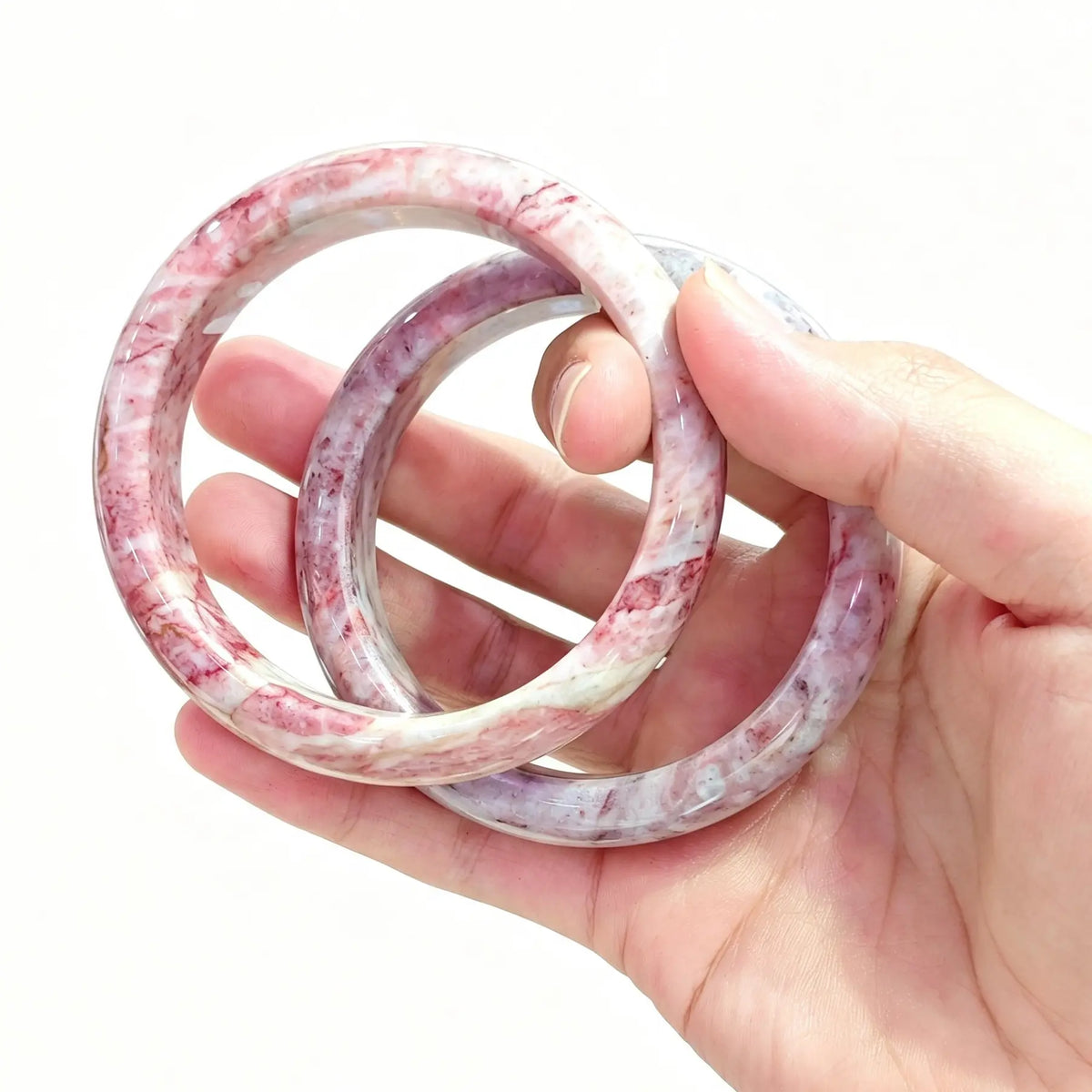 Cinnabar matrix carved bangles displayed for small batch inventory and 1-on-1 video preview selection