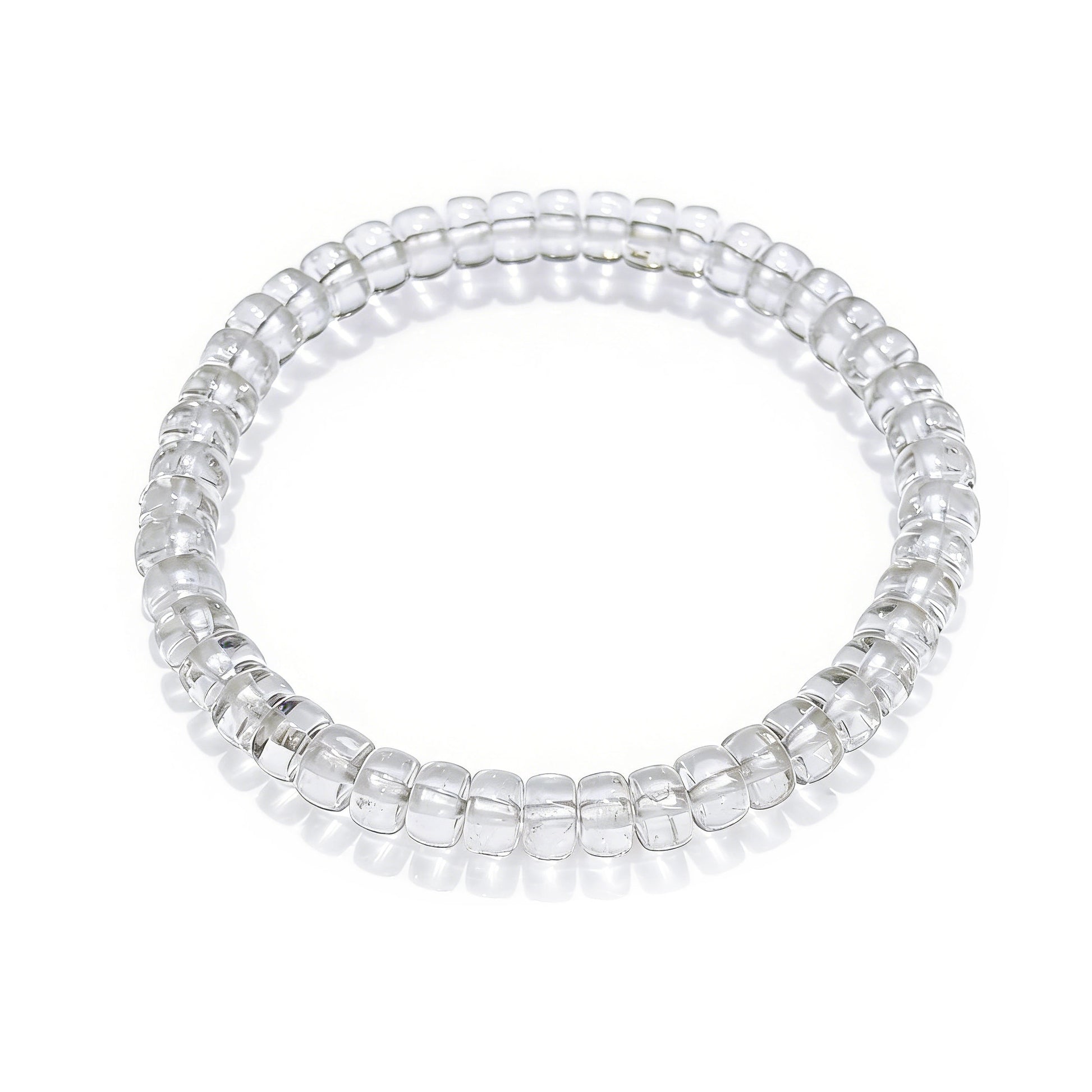 Transparent natural clear quartz disc bead stretch bracelet displayed on white background, smooth polished surface, no clasp