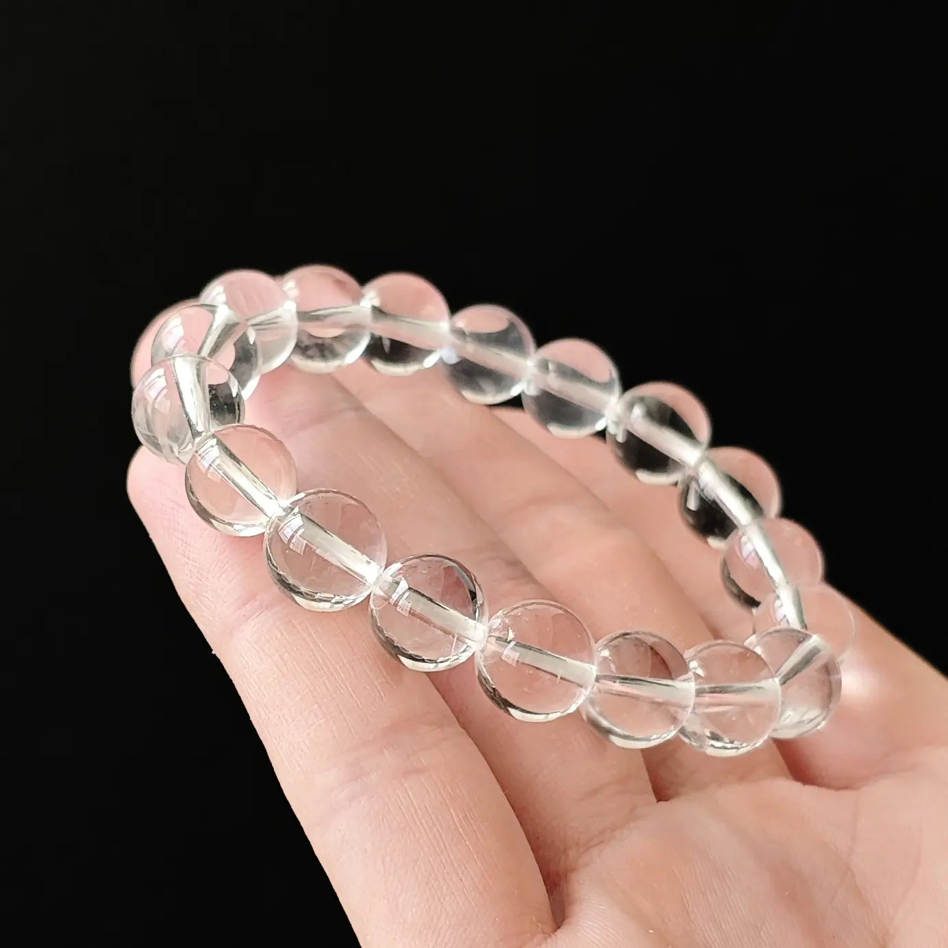 High-clarity natural quartz round beads with zero visible cotton or cloudiness, elastic stretch design, minimalist crystal accessory for daily mindful wear