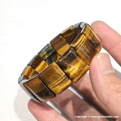 Side view of yellow tiger eye bracelet showing sharp rectangular bead edges, 20mm length, and polished facets — ideal for retail display detail