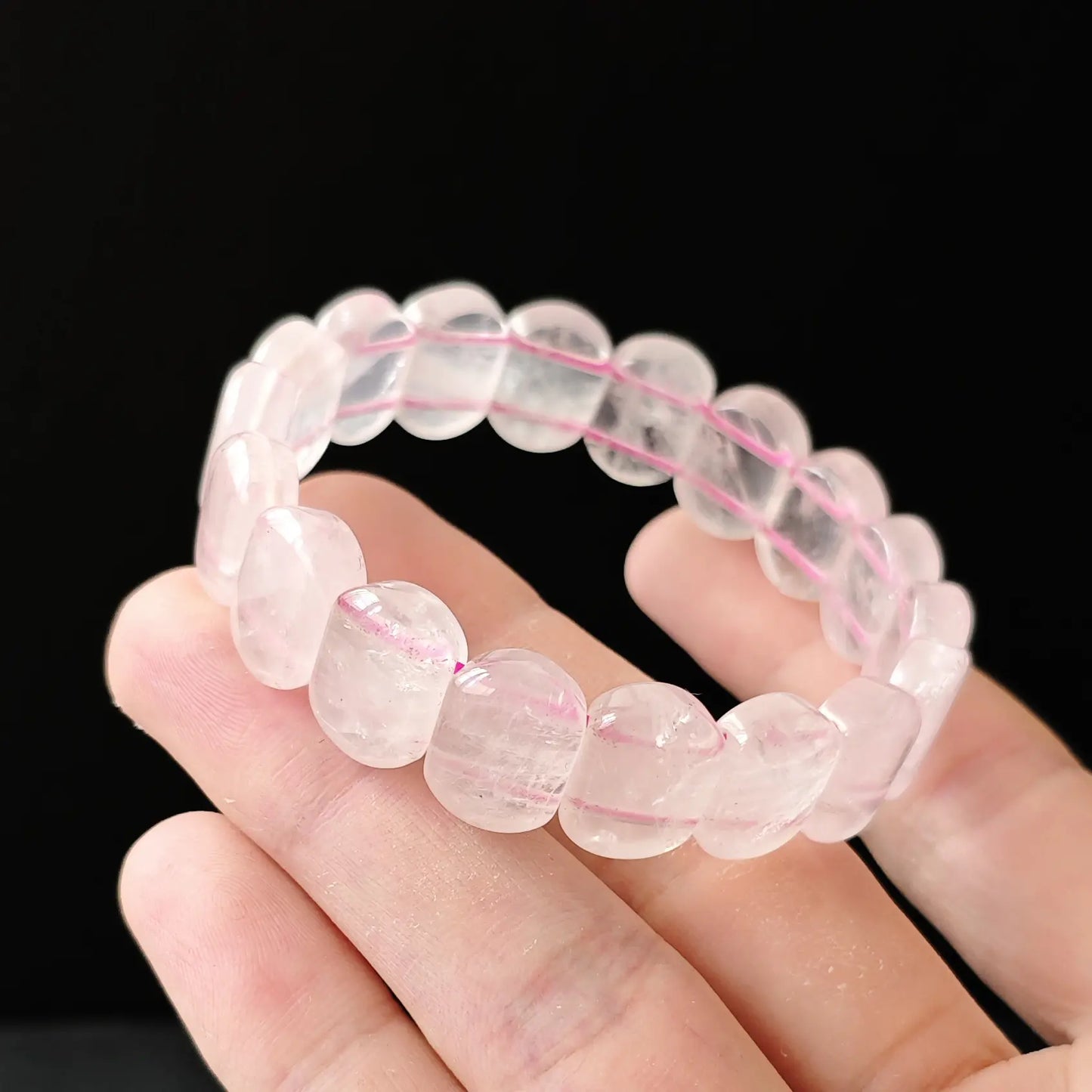 Authentic natural rose quartz oval beads, hand-polished finish, gentle pink hue ideal for sensitive skin and daily layering