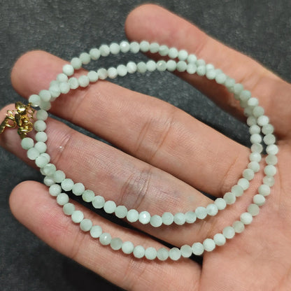 Coiled 3mm faceted green angelite gemstone necklace suited for boutique store displays and layering