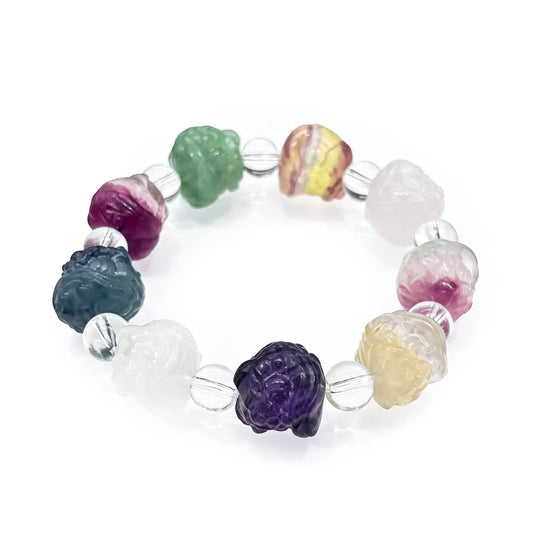 Multi-color fluorite beads carved as traditional lion dance heads, alternating with clear crystal spacers—stretch elastic design