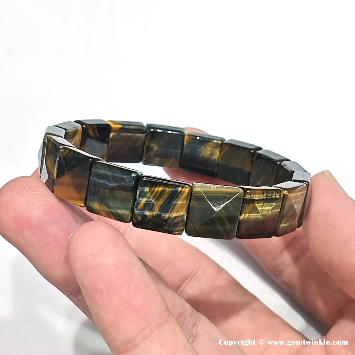Side view showing pyramid-faceted edges on ~10mm square tiger eye beads, highlighting light reflection and natural banding — women’s delicate crystal jewelry