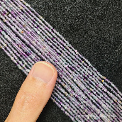 Bulk assortment of fine 3mm violet crystal beads with natural internal inclusions