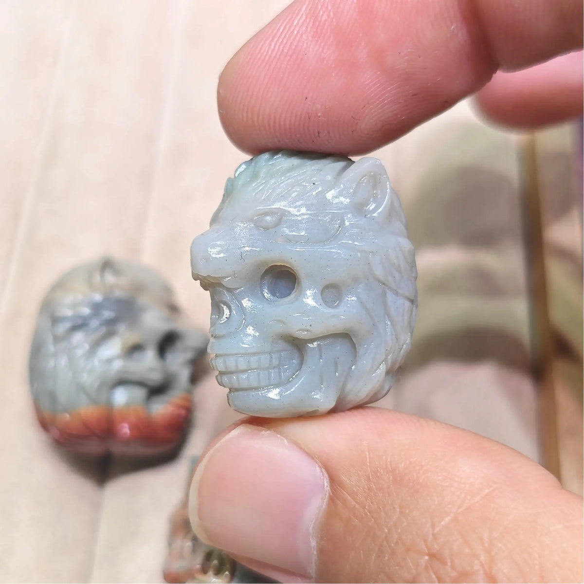 wolf-head-skull-pocket-charm-three-quarter-view