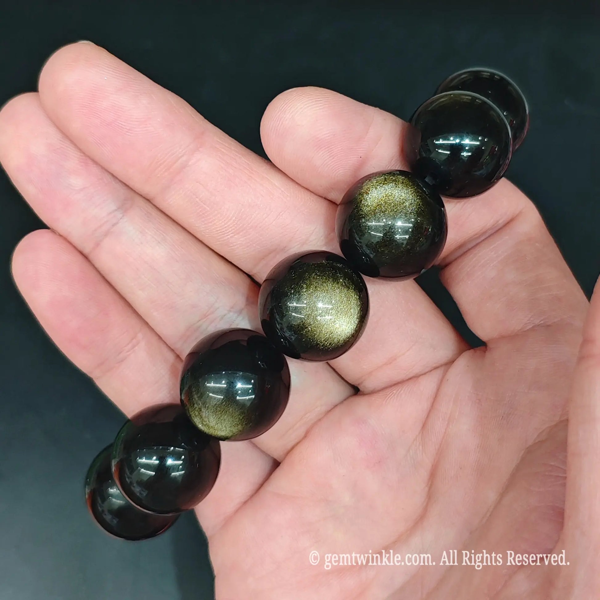 glossy black gold sheen obsidian bead bracelet top view