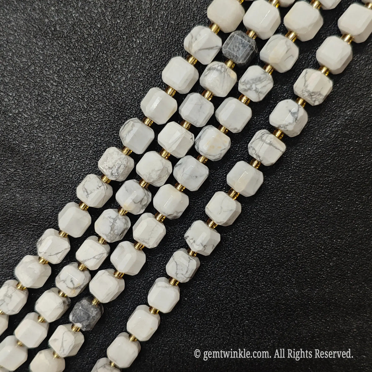 Macro close-up showing the milky white canvas and grey spiderweb details of white turquoise blocks