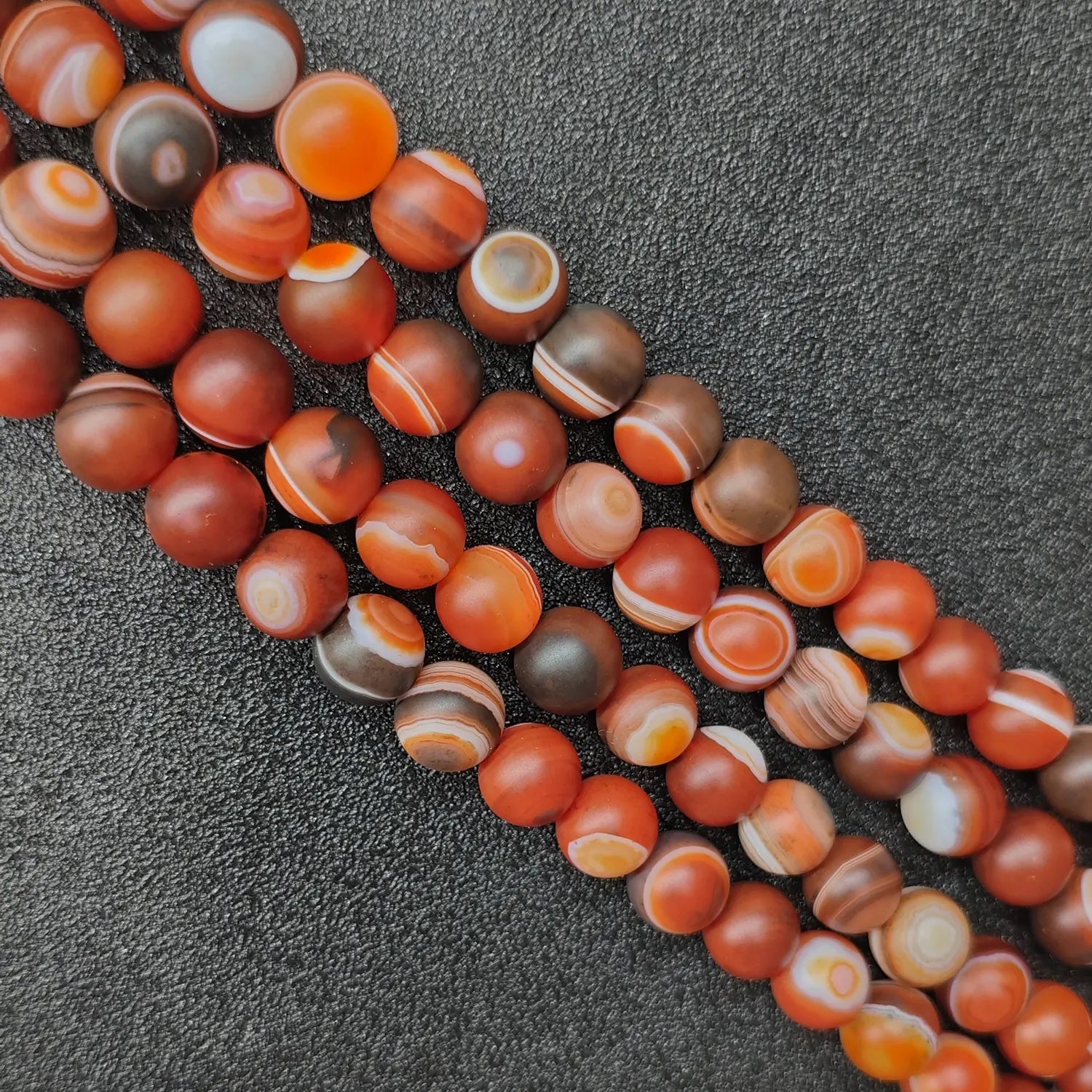 Wholesale matte red dzi agate gemstone beads strand detail