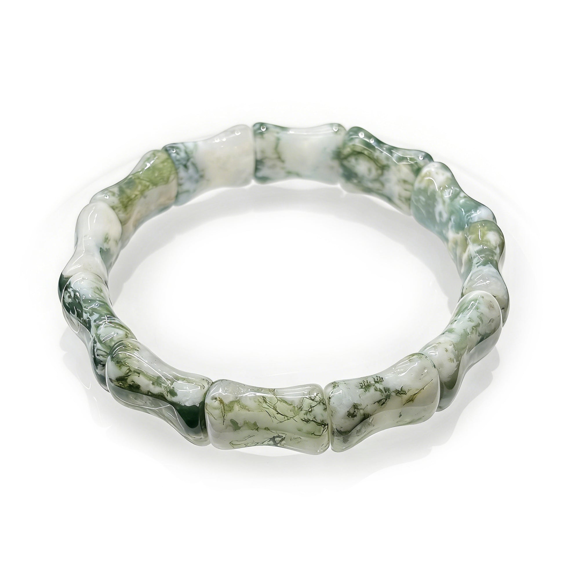  Close up of the natural moss agate bamboo bead texture and green inclusions.