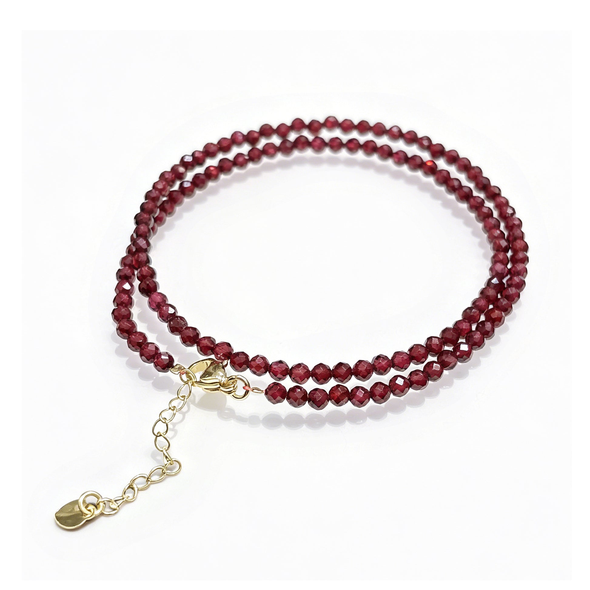 Natural deep red garnet faceted round beads (3mm) in dual-layer wrap bracelet, gold-toned adjustable chain with heart charm