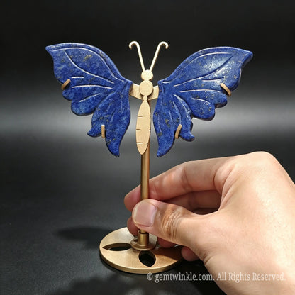 Carved natural lapis lazuli butterfly gemstone figurine with deep blue color and pyrite specks