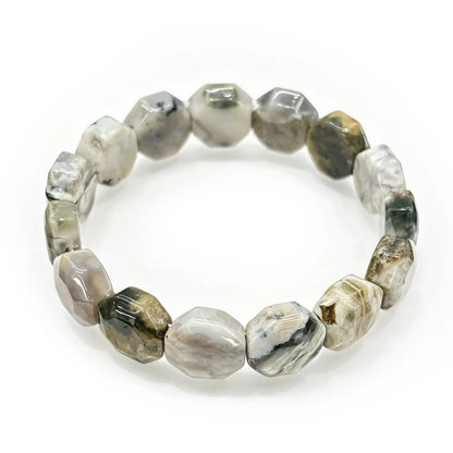 Authentic natural Ocean Jasper bracelet with genuine faceted round beads, showing characteristic concentric banding—no dye, no resin