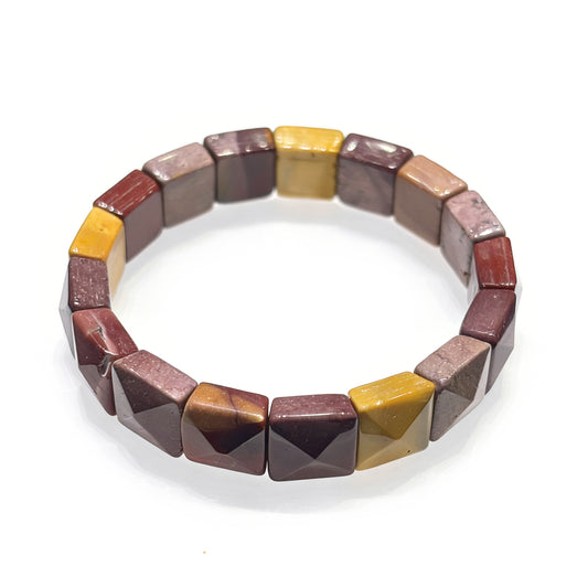 Natural yellow jasper square pyramid bracelet with multi-tonal earthy beads; geometric cut, stretchable for grounding daily wear