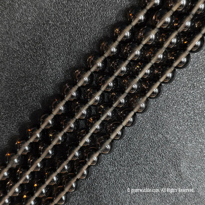 Natural ice obsidian crystal beads strands showing beautiful translucent smoky tea color under light
