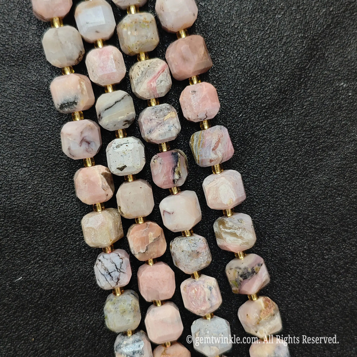 Fingers holding natural pink opal soft square gemstone block beads to show scale and proportion[cite: 6]