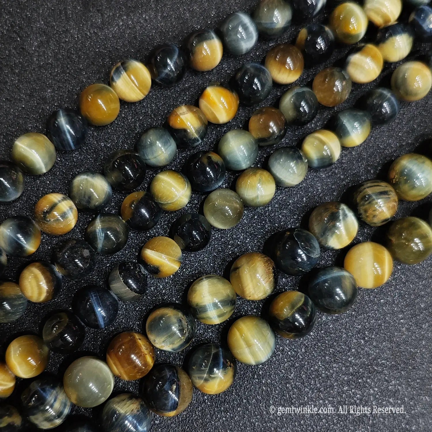 High polish dream tigers eye gemstone loose beads displaying cosmic swirling patterns