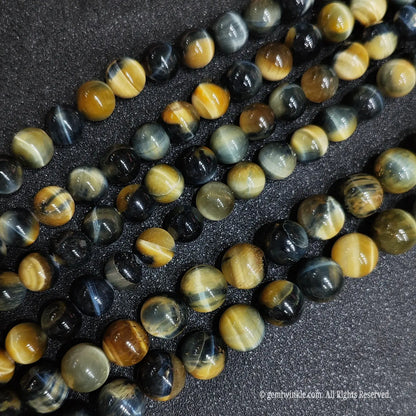 High polish dream tigers eye gemstone loose beads displaying cosmic swirling patterns
