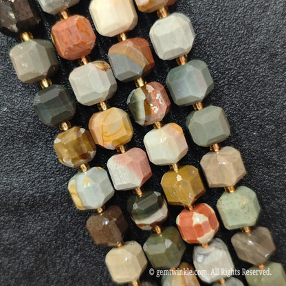 Detailed macro view of natural ocean jasper geometric cube beads showcasing earthy color mixes and natural matrix