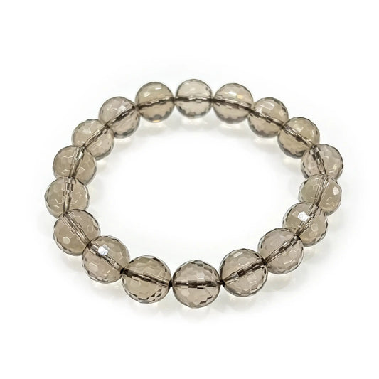 Faceted smoky quartz beads in deep gray tones, cut with precision facets to catch light—stretch elastic design, no spacers