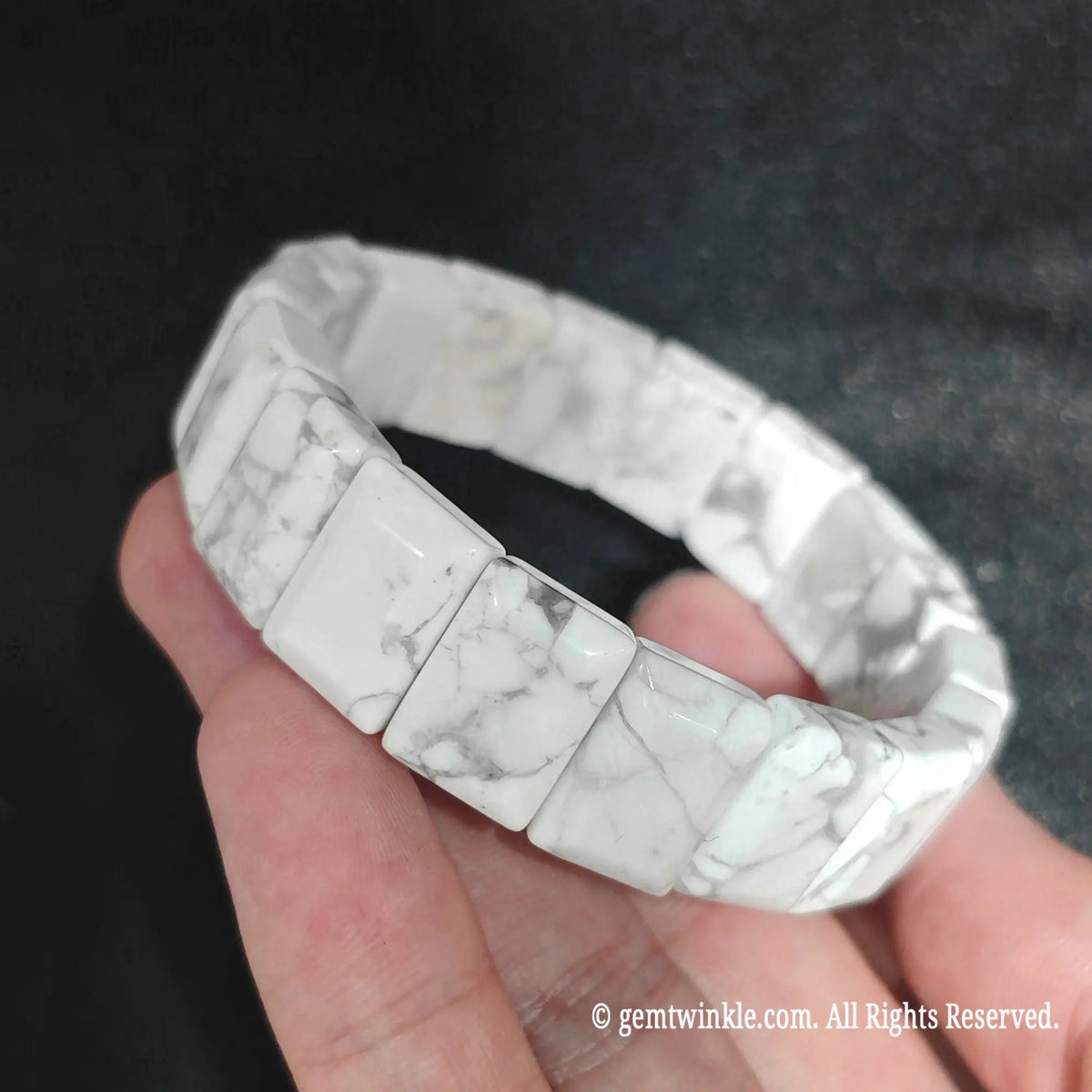 White Turquoise Rectangular Plate Beads Close Up on Hand