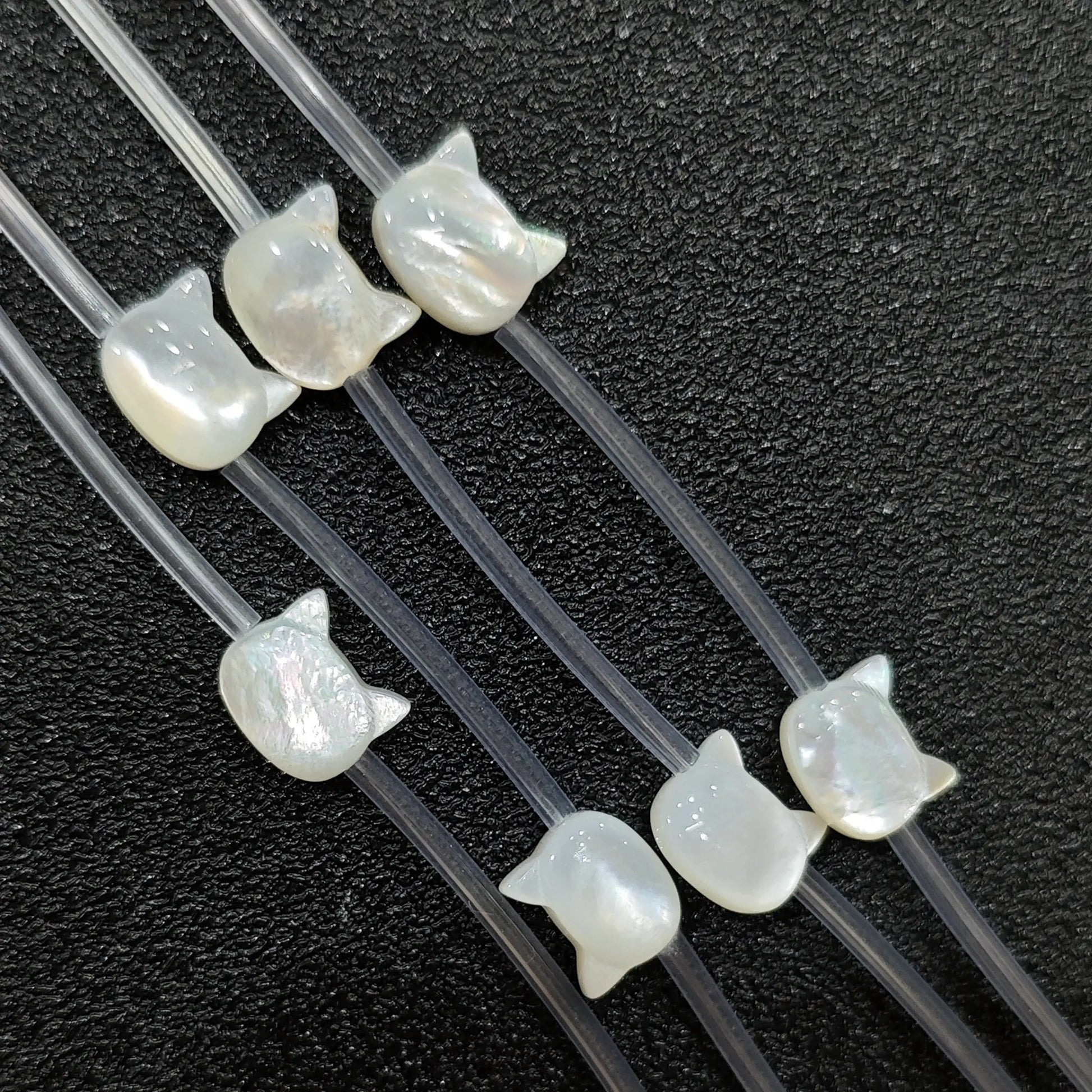 close-up-carved-white-shell-cat-face-charms