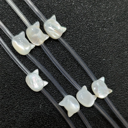 close-up-carved-white-shell-cat-face-charms
