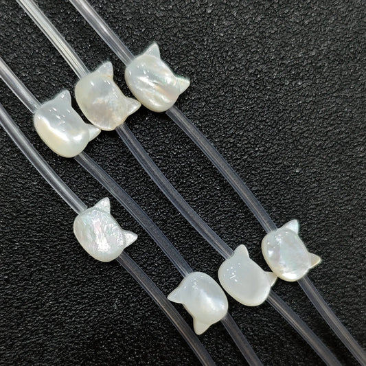 close-up-carved-white-shell-cat-face-charms