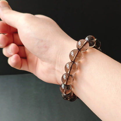 Smoky quartz handchain worn on wrist
