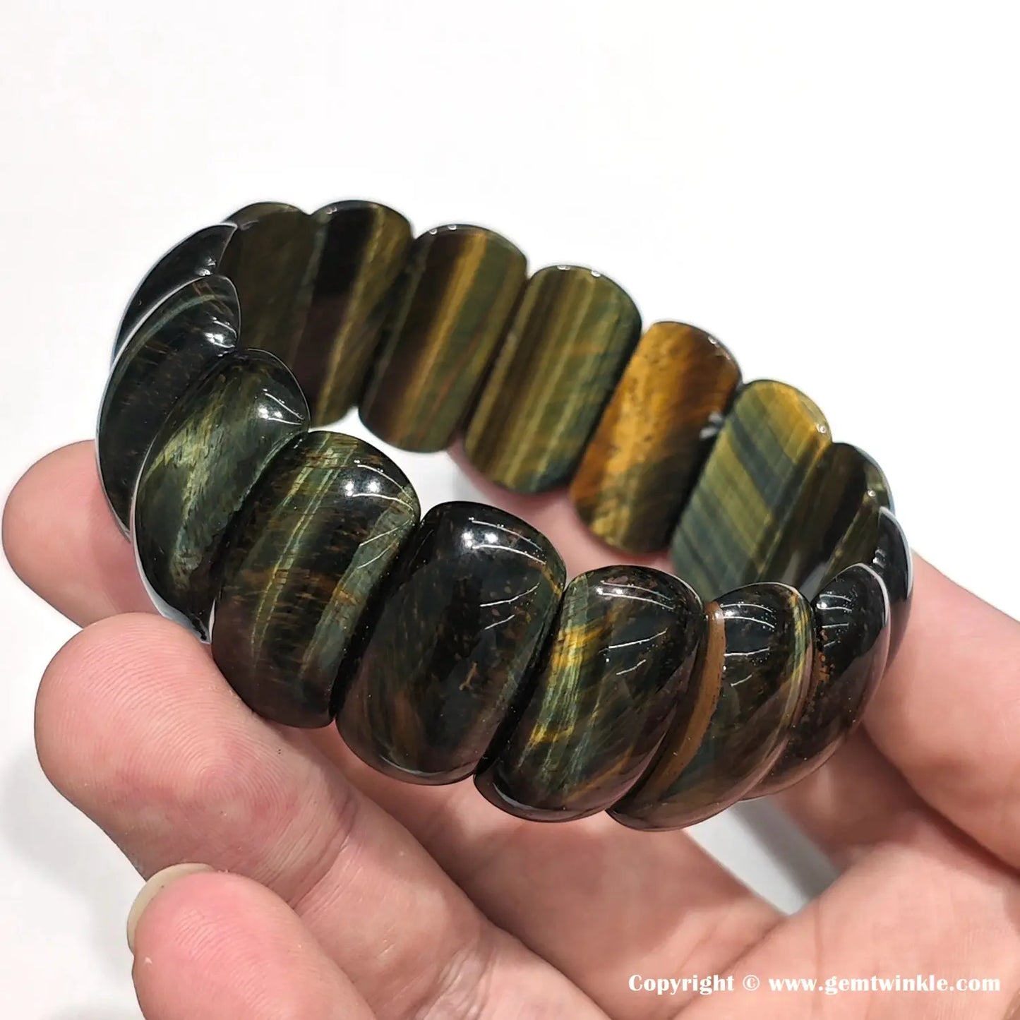 Tiger eye elastic bracelet worn on 18cm wrist, demonstrating comfortable stretch fit and vibrant multicolor bands — ideal for small business inventory