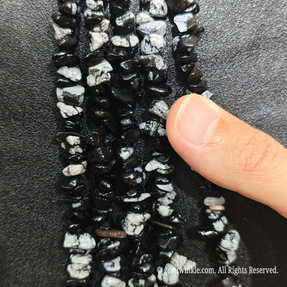 Detailed view of long 75cm natural zebra jasper chipped strand ready for modern DIY projects[cite: 9]